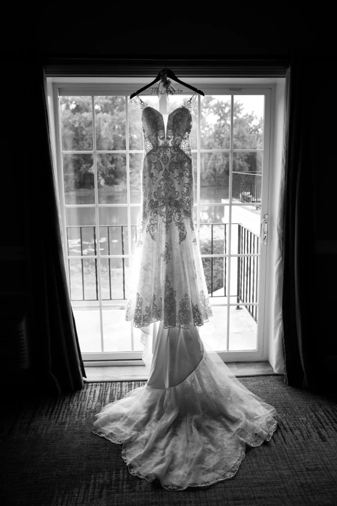 A wedding dress photo from a couple getting ready for their wedding at Glen Sanders Mansion