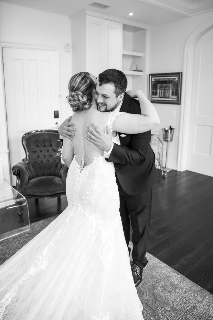 Bride and groom at a wedding at the Adelphi Hotel by Saratoga wedding photographer Caitlin Miller