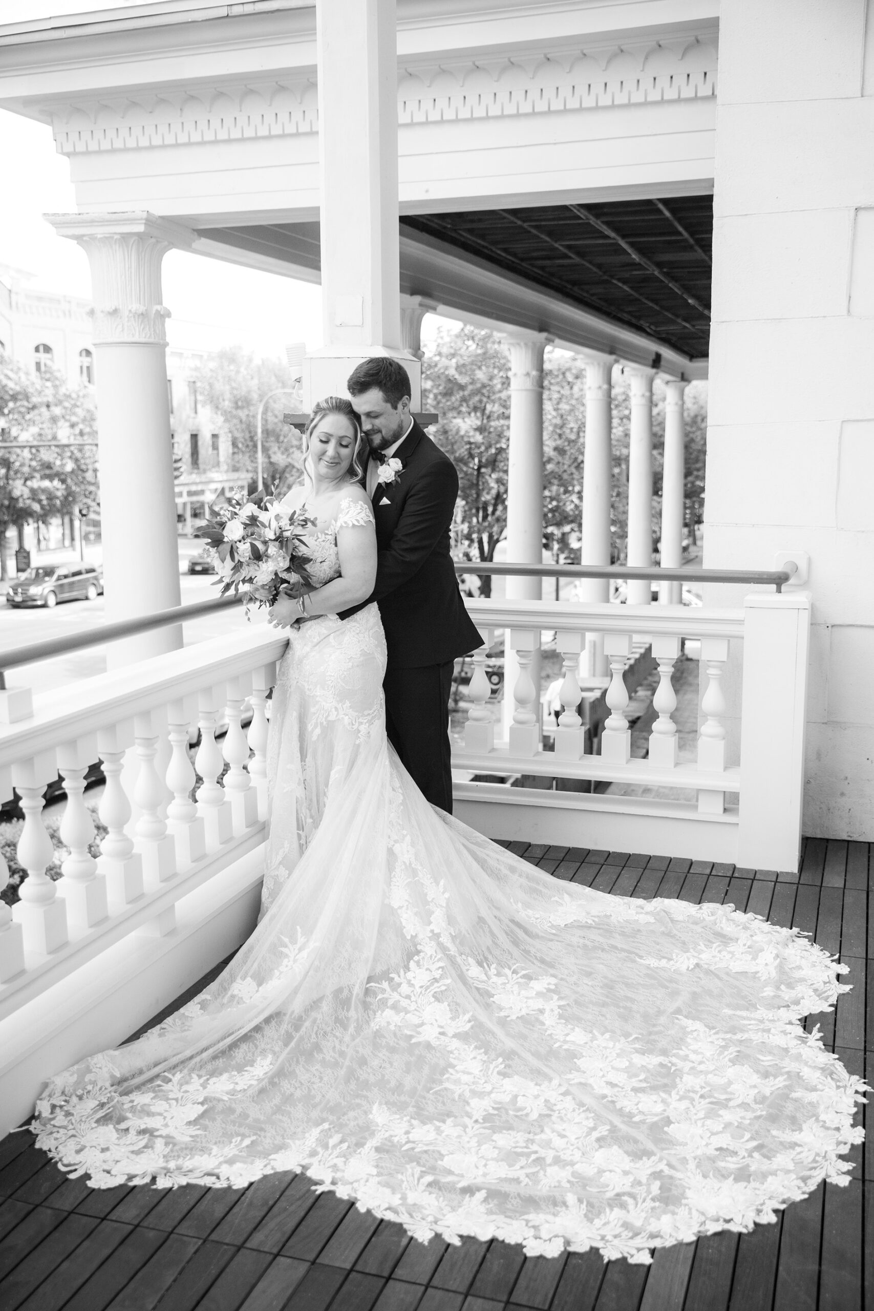 Bride and groom at a wedding at the Adelphi Hotel by Saratoga wedding photographer Caitlin Miller