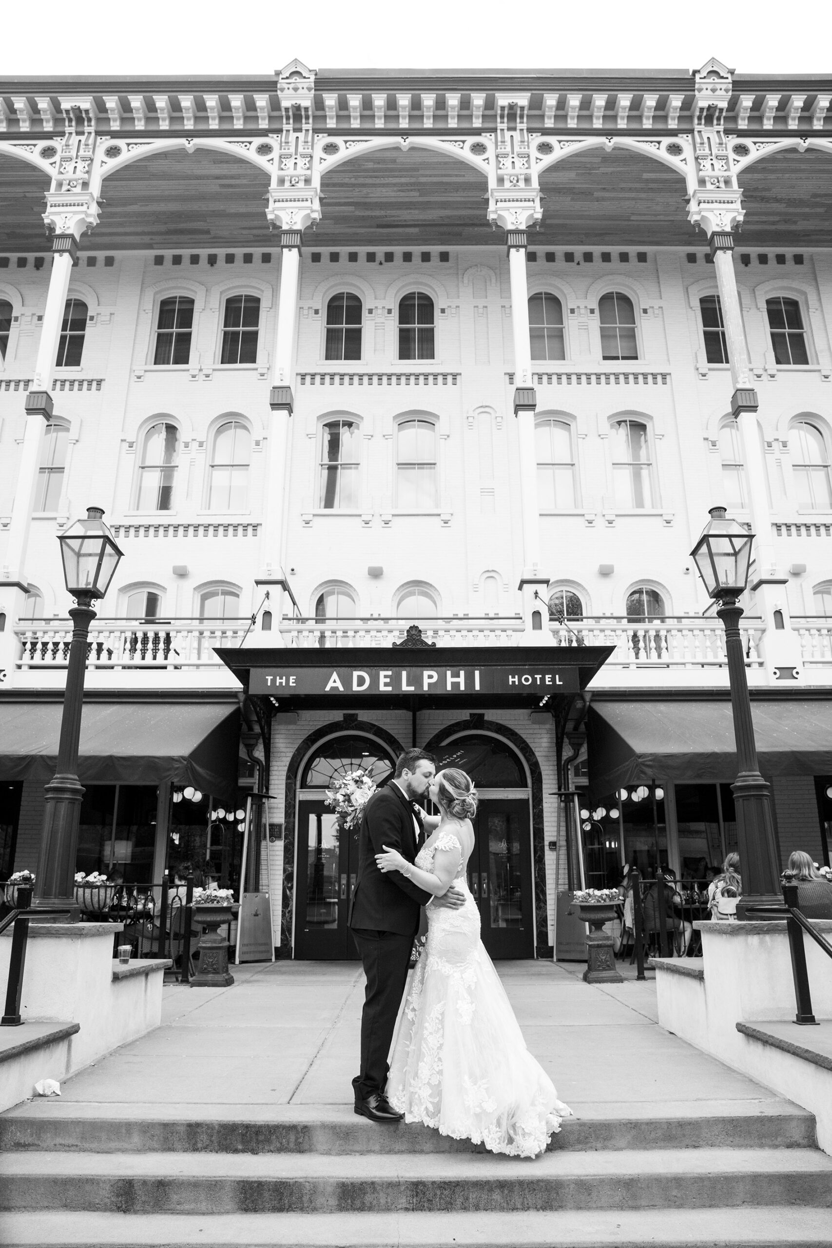 Bride and groom at a wedding at the Adelphi Hotel by Saratoga wedding photographer Caitlin Miller