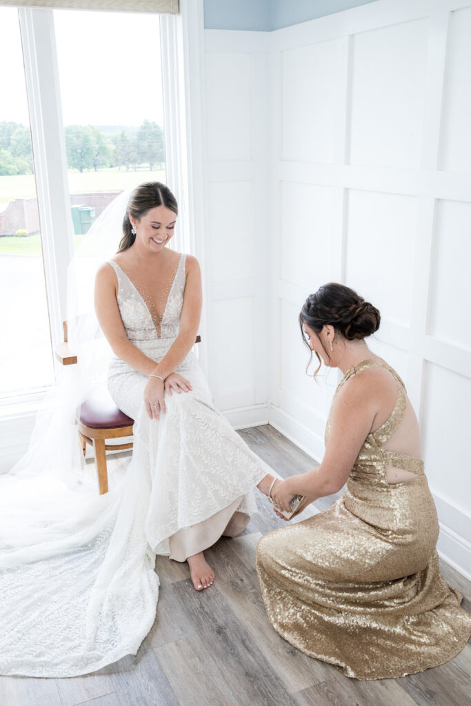 Bride getting ready at a hiland park country club wedding