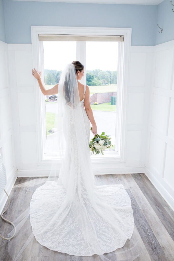 Bride getting ready at hiland park country club queensbury