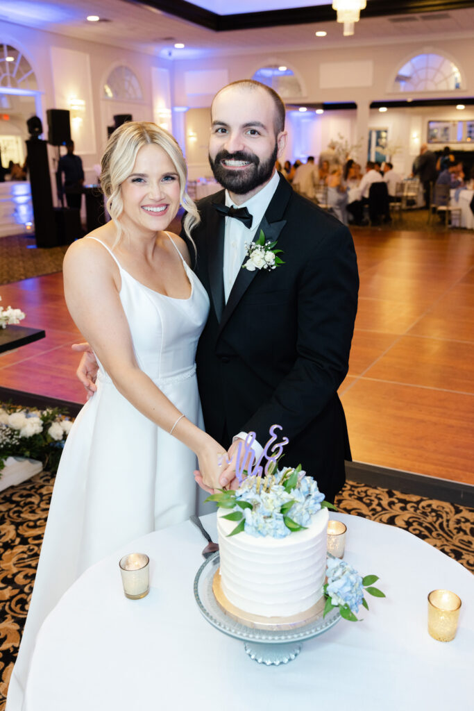 Photo of a couple at their wedding at the Hiland Country Club Queensbury, NY