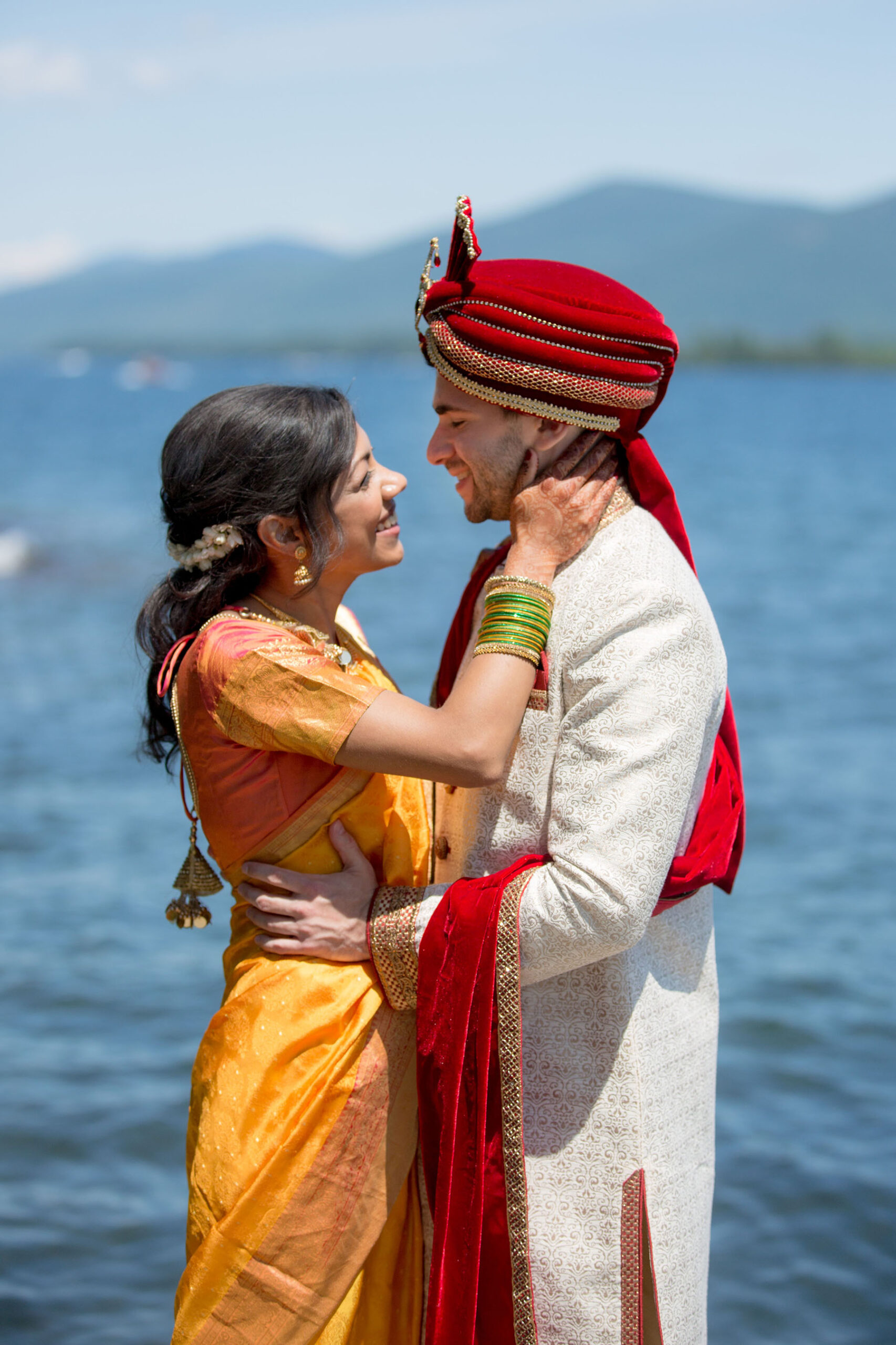 Couple in indian attire at an indian and jewish wedding on lake george from a one of the best lake george wedding locations