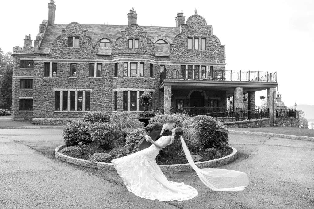 The bride and groom at an inn at erlowest wedding at the the erlowest & sun castle resort, Lake george wedding