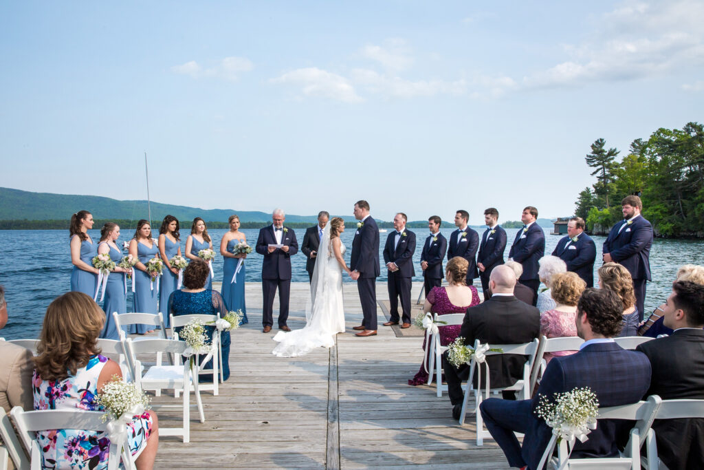 Wedding ceremony at the Lake George Club by Lake george wedding photographer Caitlin Miller