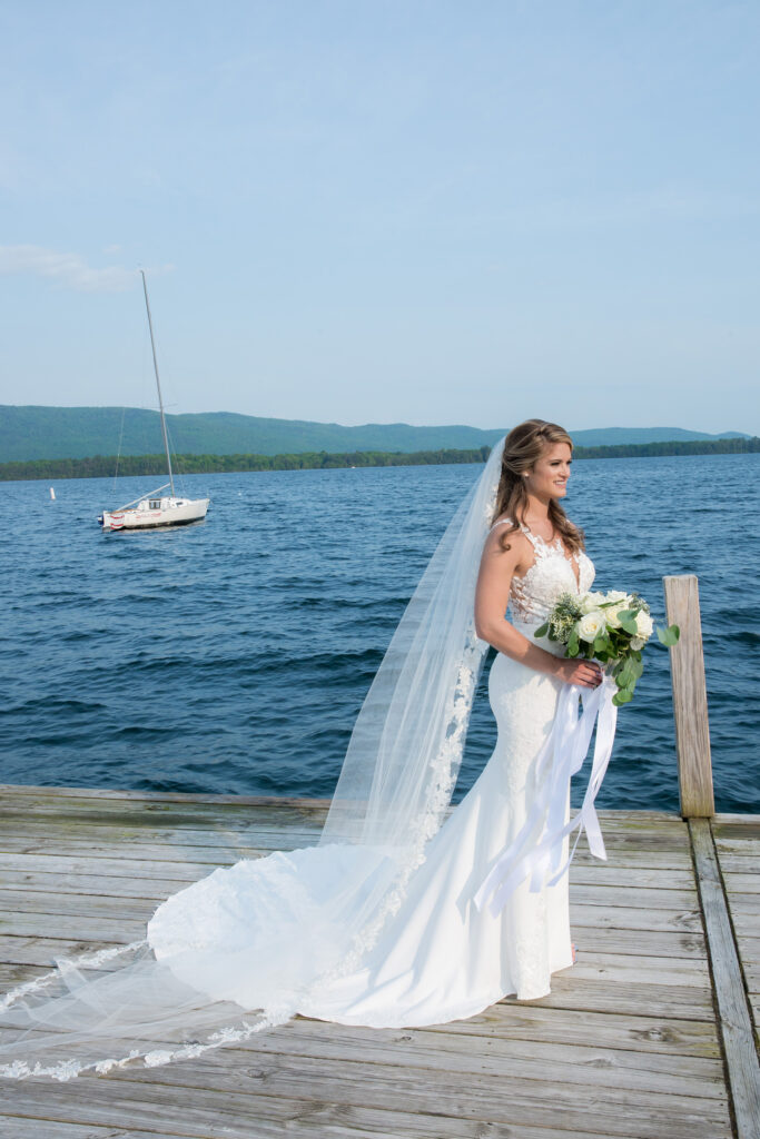 Bride at the Lake George Club by Lake george wedding photographer Caitlin Miller