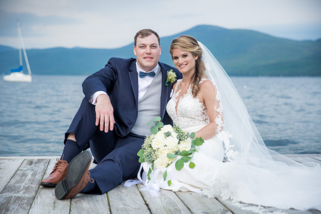 Bride and groom at the Lake George Club by Lake george wedding photographer Caitlin Miller