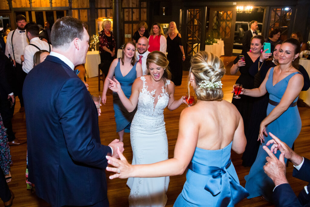 Bride and groom at the Lake George Club by Lake george wedding photographer Caitlin Miller