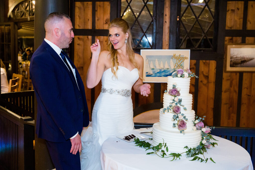 Bride and groom at the Lake George Club by Lake george wedding photographer Caitlin Miller