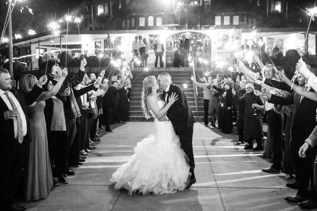 Bride and groom at the Lake George Club by Lake george wedding photographer Caitlin Miller