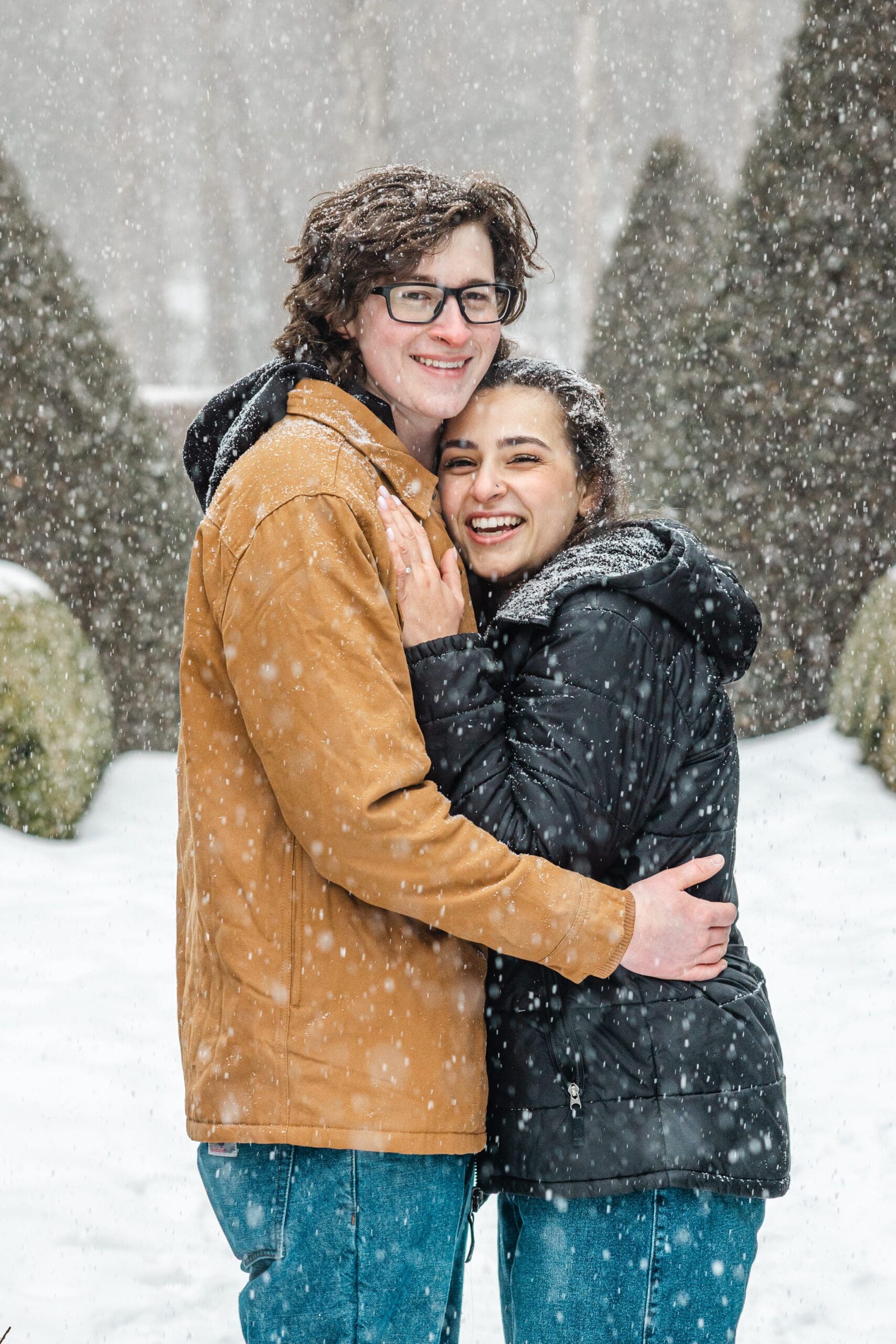 Photos from an engagement session at The Mount in Lenox Mass. The couple took photos at The Mount in a snowstorm - Photos by Saratoga Springs wedding photographer Caitlin Miller