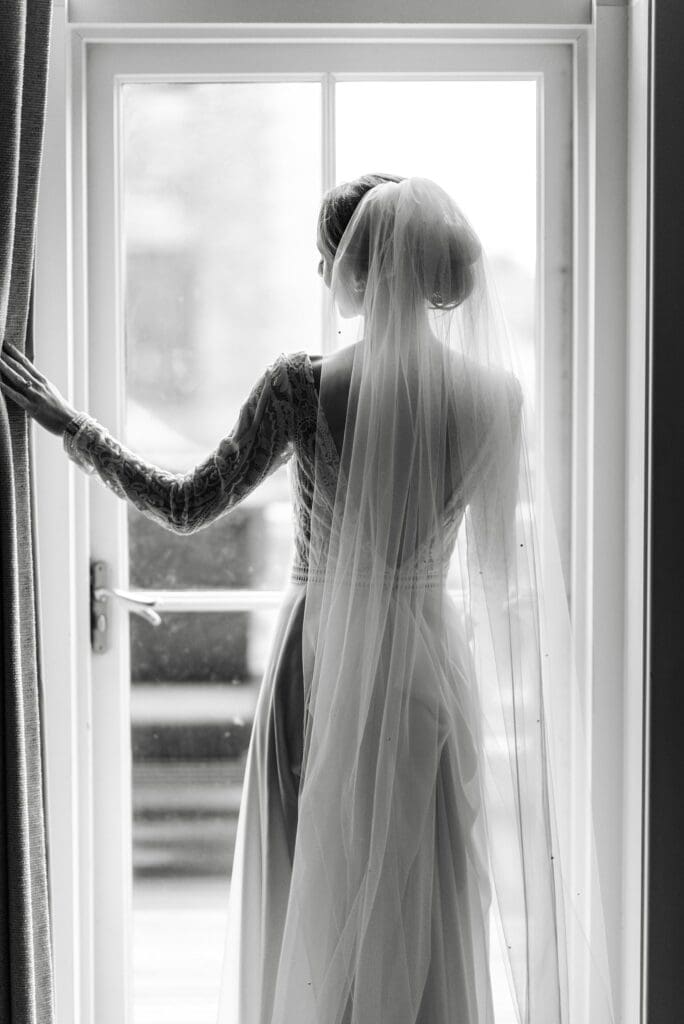 Photos from a rainy wedding at the Adelphi Saratoga by Saratoga Springs wedding photographer Caitlin Miller