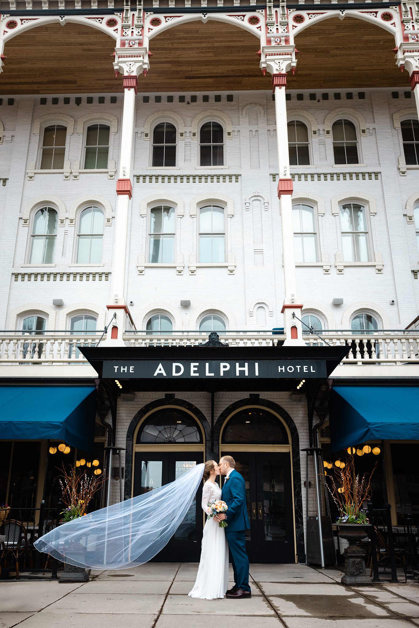 Photos from a rainy wedding at the Adelphi Saratoga by Saratoga Springs wedding photographer Caitlin Miller
