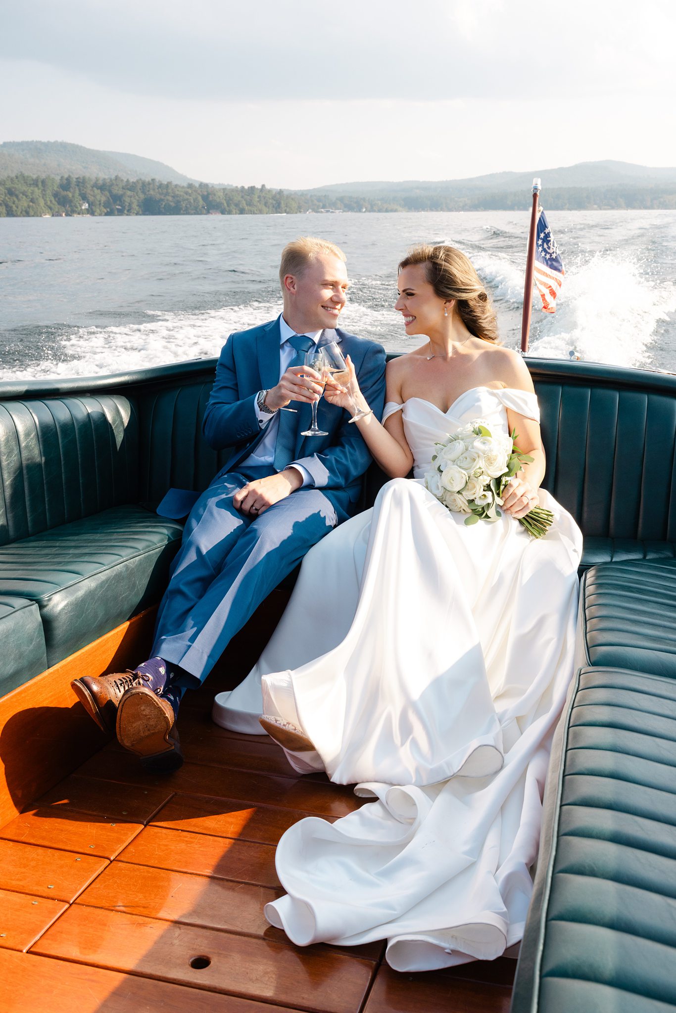 Elegant champagne photos on Lake George captured during an Inn at Erlowest wedding